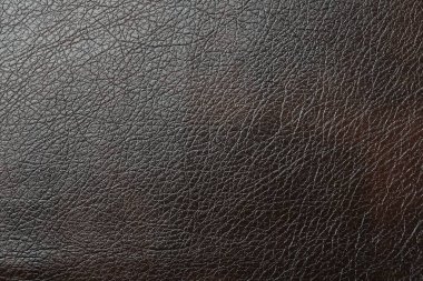 Arka plan olarak kahverengi deri dokusu, üst görünüm