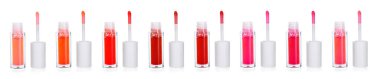 Dudak parlatıcıları beyaz üzerine izole edilmiş farklı renklerde, set