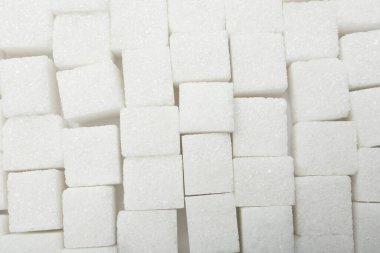 Arkaplan olarak beyaz şeker küpleri, üst görünüm
