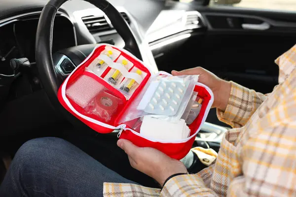Man Holding First Aid Kit Medicaments Car Closeup Imagem De Stock