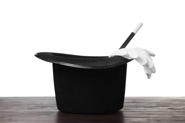 Zaubermütze Handschuhe Und Zauberstab Auf Holztisch Vor Weißem Hintergrund — Stockfoto