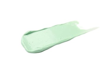 Beyaz üzerine izole edilmiş yeşil renk düzeltme kapatıcısı vuruşu