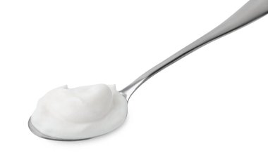 Beyaz kaşık içinde nefis bir yoğurt.