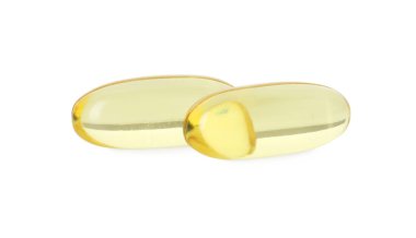 Beyaza izole edilmiş vitamin kapsülleri. Sağlık takviyesi