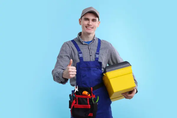 Professional Repairman Tool Box Showing Thumbs Light Blue Background — Stock Photo, Image