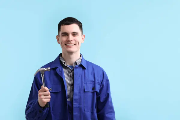 Professional Repairman Holding Hammer Light Blue Background Space Text — Stock Photo, Image