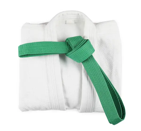 stock image Martial arts uniform with green belt isolated on white, top view