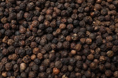 Aromatik baharat. Arkaplan olarak karabiber, üst görünüm