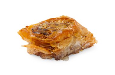 Doğu tatlıları. Lezzetli bir baklava parçası beyaza izole edilmiş.