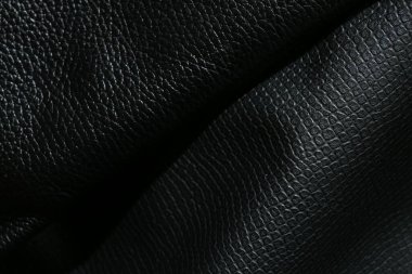 Arka plan olarak siyah doğal deri, üst görünüm