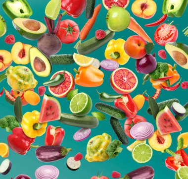 Deniz mavisi zemininde farklı taze meyve ve sebzeler