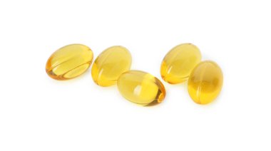 Beyaza izole edilmiş vitamin kapsülleri. Sağlık takviyesi