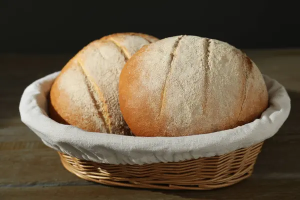 Wicker Basket Fresh Bread Wooden Table Closeup — Stock Photo, Image