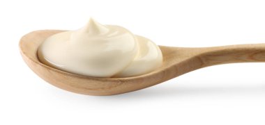 Beyaz kaşık içinde doğal yoğurt.