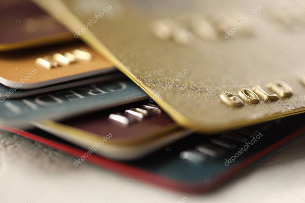 Plastic credit cards on table, macro view