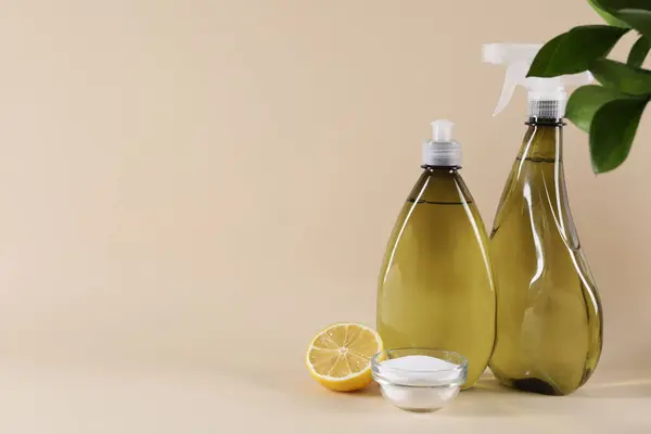 Bottles Cleaning Product Lemon Baking Soda Beige Background Space Text Stok Gambar Bebas Royalti