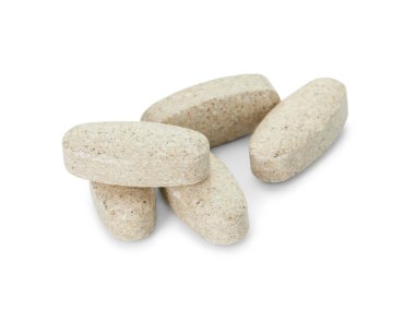 Beyaza izole edilmiş vitamin hapları. Sağlık takviyesi