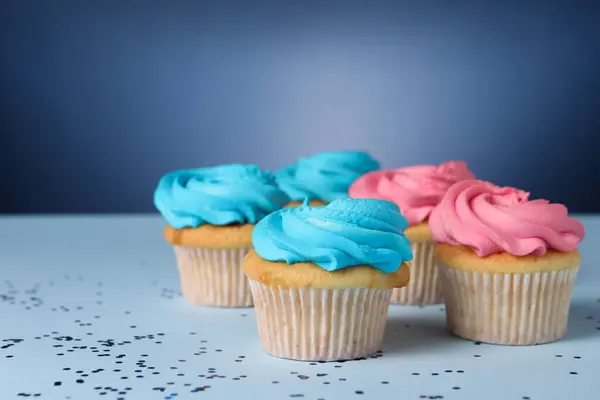 Delicious Cupcakes Bright Cream Confetti Blue Background Space Text Стокове Зображення