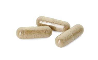 Beyaza izole edilmiş vitamin kapsülleri. Sağlık takviyesi