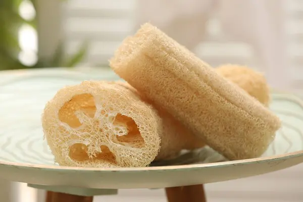 stock image Loofah sponges on coffee table indoors, closeup