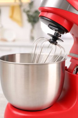 Modern red stand mixer in kitchen, closeup