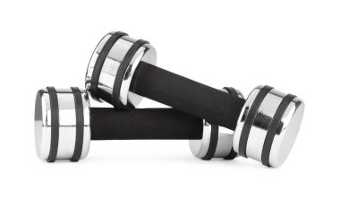 Metal dambıllar beyaza izole edilmiş. Spor malzemeleri.