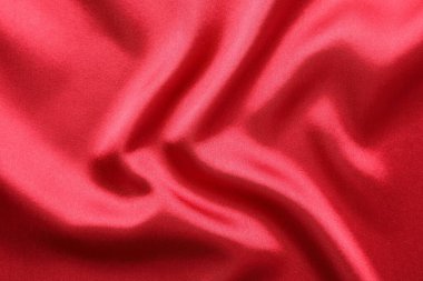 Arka plan olarak güzel kırmızı ipek kumaş dokusu, yakın plan