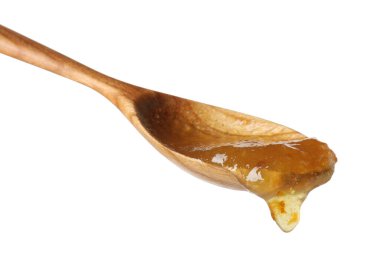 Tatlı reçelli kaşık beyaz üzerine izole