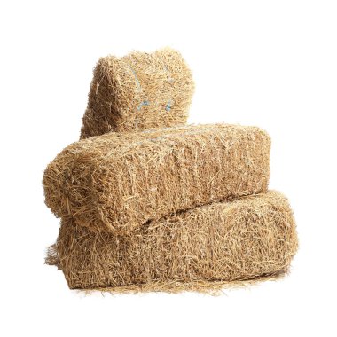 Kurumuş saman balyaları beyaza izole edilmiş.