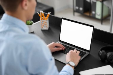 Man watching webinar at table in office, closeup