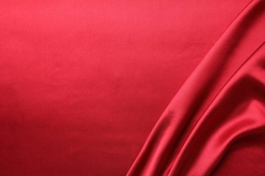 Arka plan olarak güzel kırmızı ipek kumaş dokusu, yakın plan