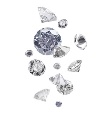 Beyaz arka planda havada parlayan güzel elmaslar