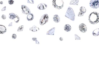 Beyaz arka planda havada parlayan güzel elmaslar