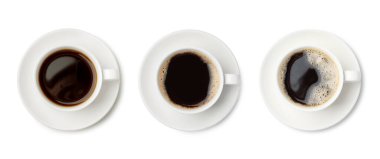 Aromatic coffee in cups isolated on white, top view