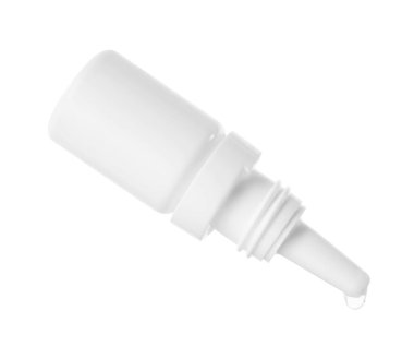 Beyaz arka planda şişeden damlayan tıbbi damlalar