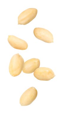 Many peanuts in air on white background