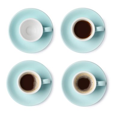 Aromatic coffee in cups isolated on white, top view