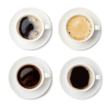 Aromatic coffee in cups isolated on white, top view