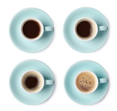 Aromatic coffee in cups isolated on white, top view