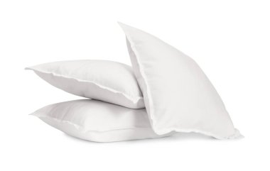 Beyaz üzerine izole edilmiş üç yeni yumuşak yastık