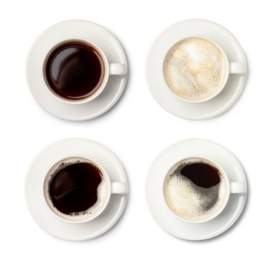 Aromatic coffee in cups isolated on white, top view