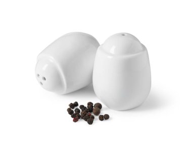 Salt and pepper shakers with grains isolated on white clipart