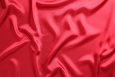 Arka plan olarak güzel kırmızı ipek kumaş dokusu, yakın plan