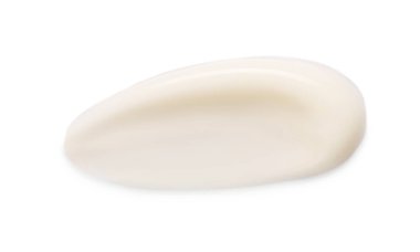 Beyaz arka planda yüz kremi örneği, üst görünüm