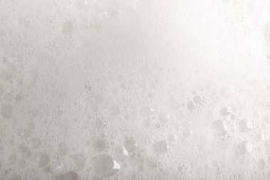 Arka plan olarak beyaz kabarık köpük, üst görünüm