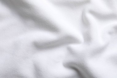 Arkaplan olarak beyaz kumaşın dokusu, üst görünüm