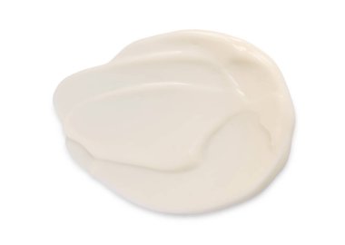 Beyaz arka planda yüz kremi örneği, üst görünüm