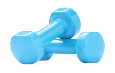 Açık mavi halterler beyaza izole edilmiş. Spor malzemeleri.