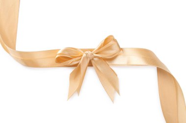 Beyaz yay ile altın saten kurdeleler, üst görünümde izole