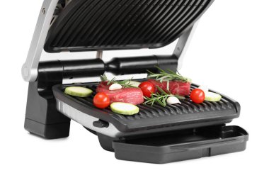 Beyaz et, biberiye ve sebzeli elektrikli ızgara.